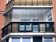 Безрамное остекление балконов и лоджий: плюсы, минусы, технология